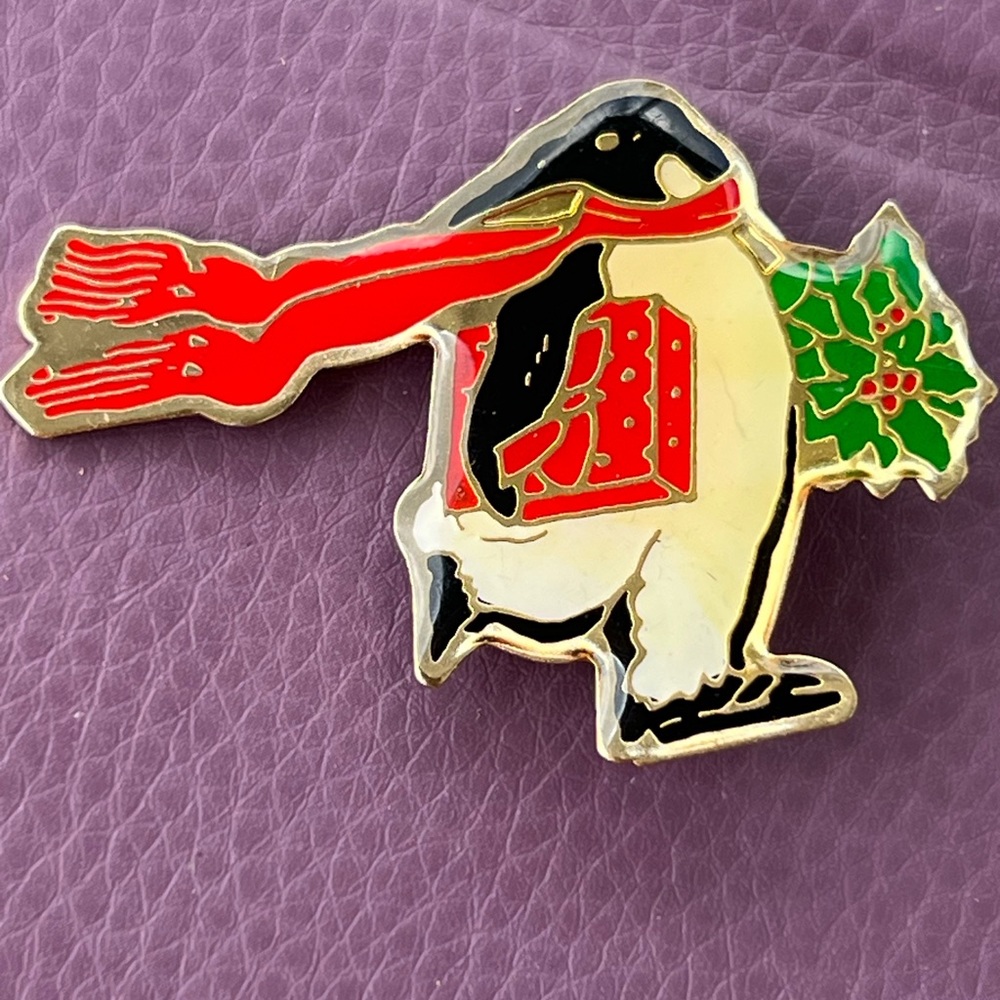 Signed Schmidt enamel skating penguin pin